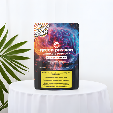 Green Passion Amnesia Haze Popcorn – Hochwertige 10g CBD-Blüten, stilvoll präsentiert in einem Mock-Up. Für Kenner, die aromatische Haze-Noten schätzen.